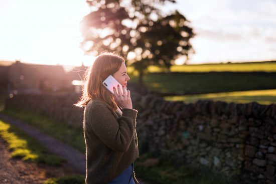 photo of woman on her mobile phone in Longnor, Staffordshire