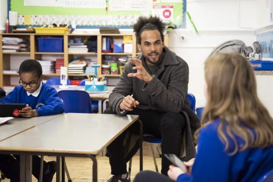 Dev Griffin talking to pupils at Salusbury School