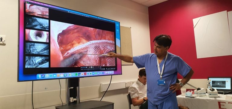 image of Professor Shafi Ahmed instructing surgical trainees
