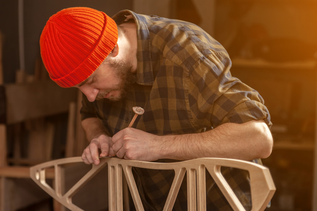 Carpenter in red woolly hat